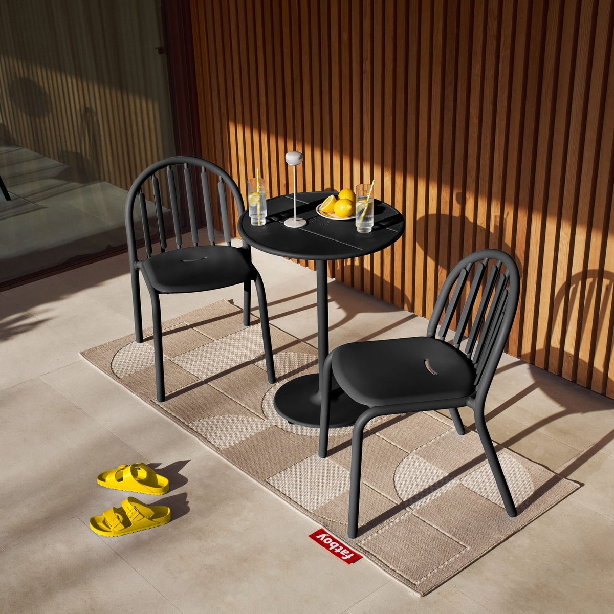 Lightweight Fred&#39;s Bistro Set designed with weather-resistant materials for stylish and functional outdoor dining.