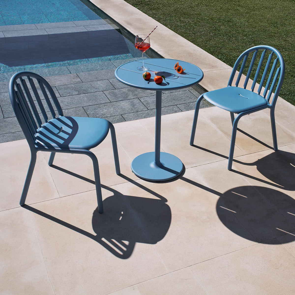 Modern Fred&#39;s Bistro Set by Fatboy providing a chic and practical solution for small outdoor spaces.