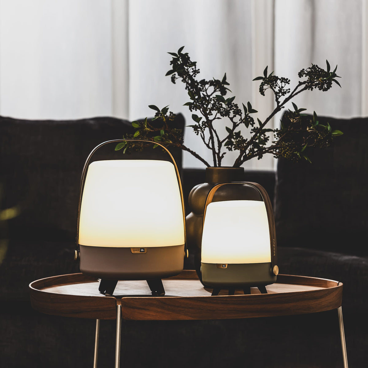 Lite-up Play by Kooduu: JBL-powered speaker and warm white lamp with minimalist aesthetics, brass details, and wooden handle.